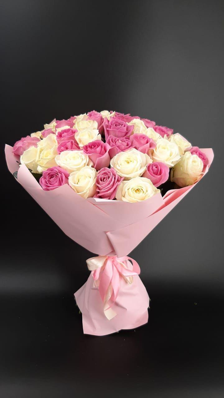 Professional floral arrangement in modern corporate setting